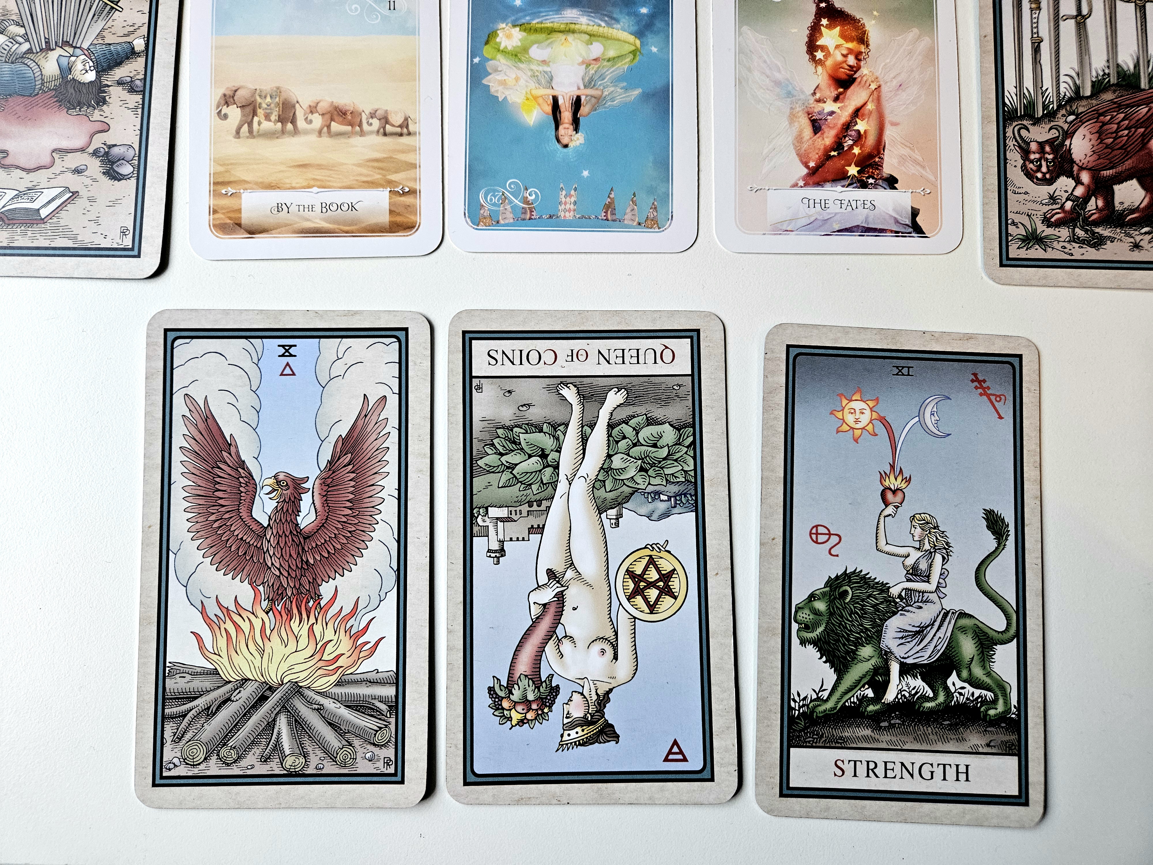 Spread base: Ten of Wands, Queen of Coins, Strength